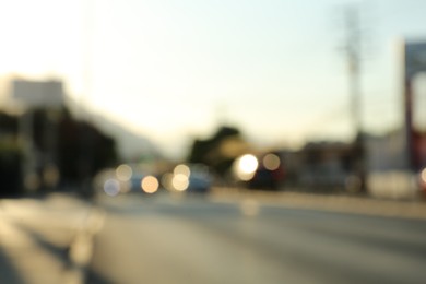 Photo of Blurred view of road with cars, bokeh effect