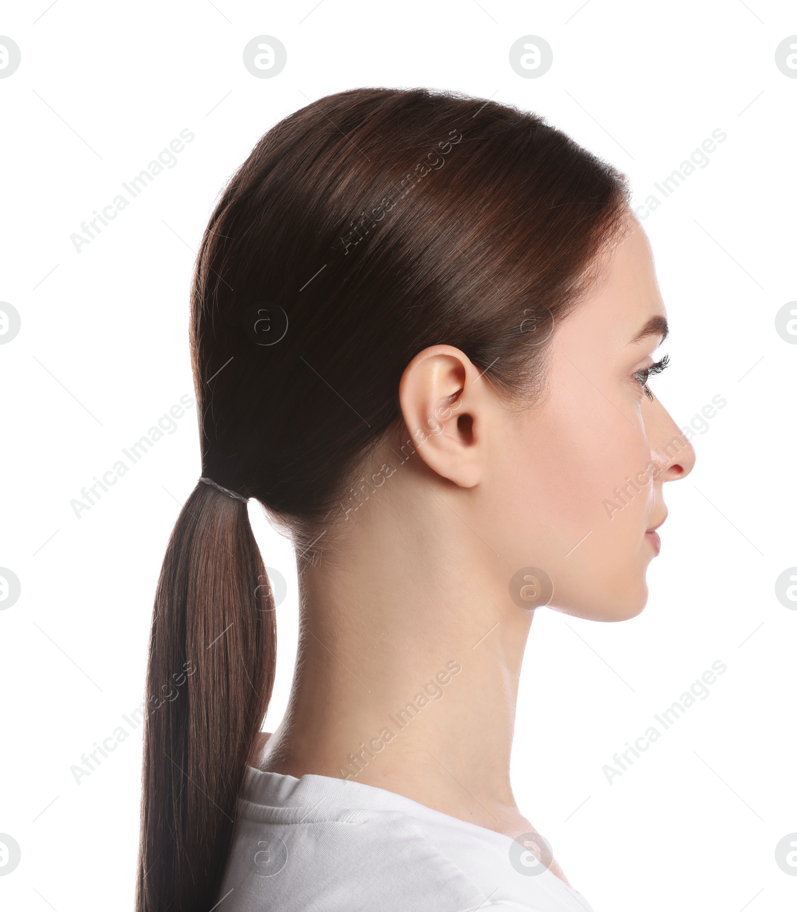 Photo of Profile portrait of young woman on white background