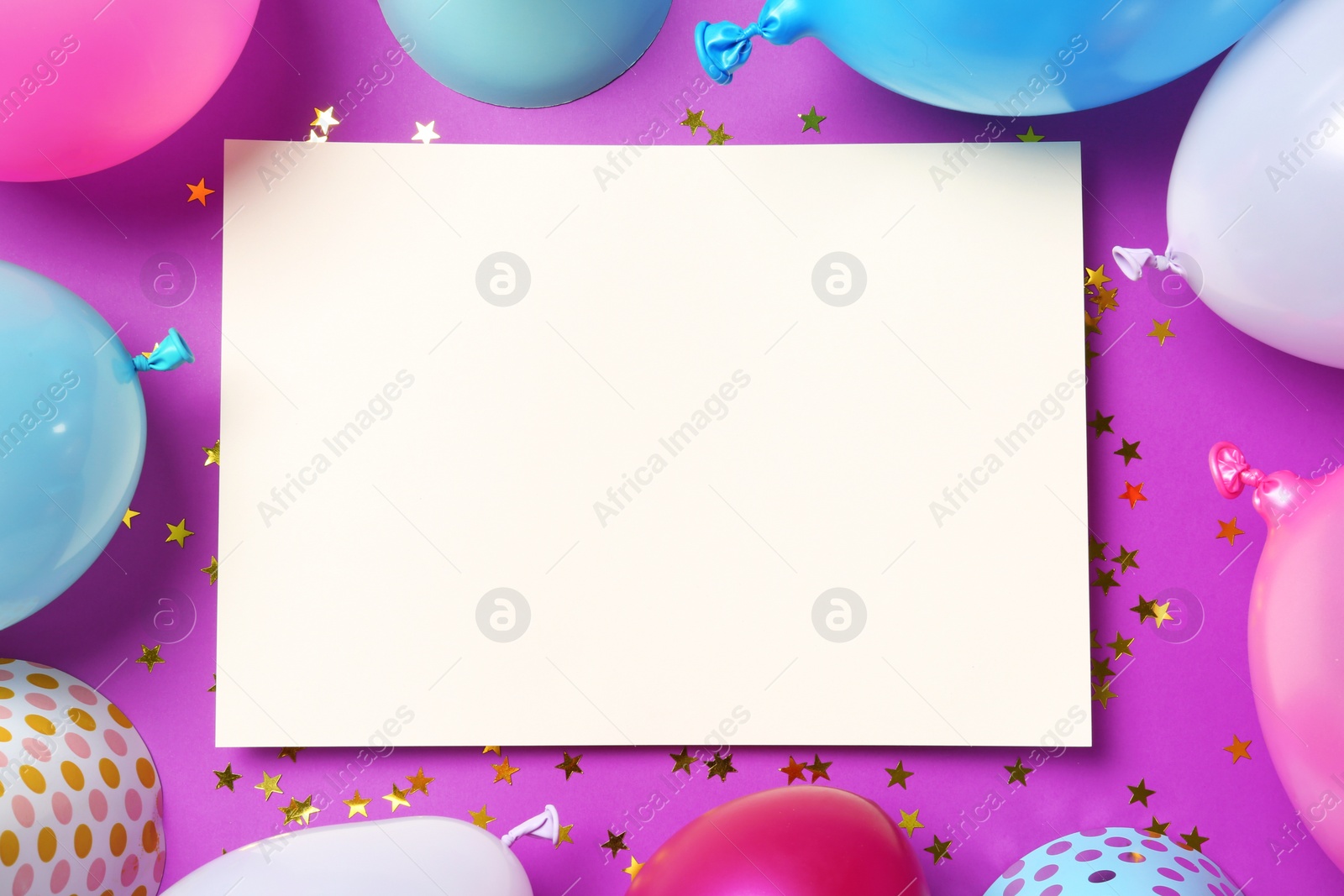 Photo of Flat lay composition of balloons and empty card with space for text on color background