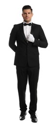 Photo of Handsome butler in elegant uniform on white background