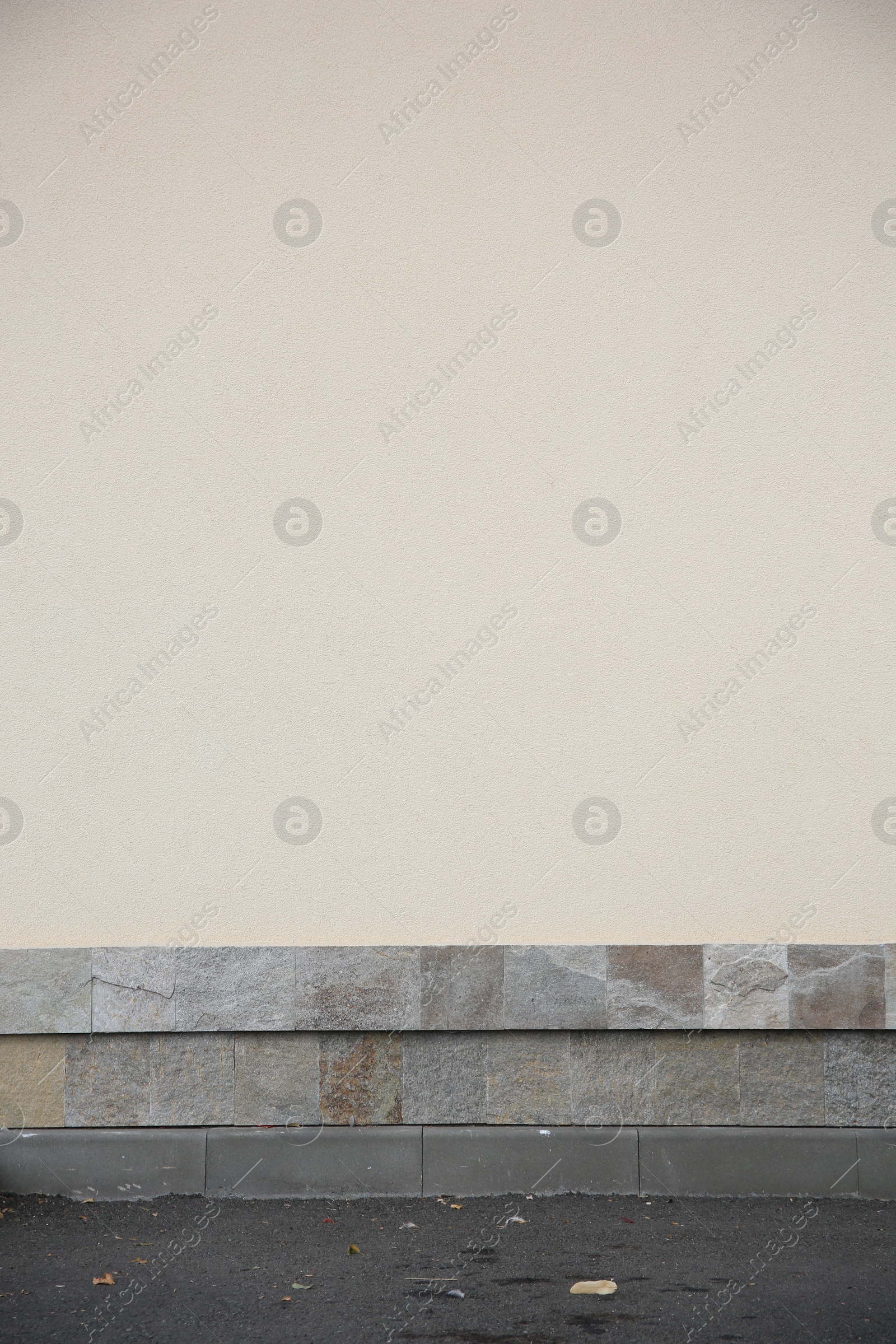 Photo of Beige wall of building outdoors. Exterior design