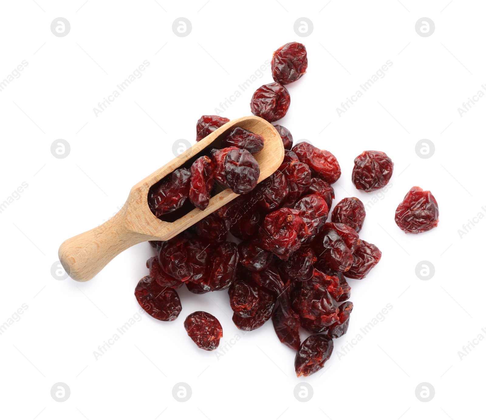 Photo of Tasty dried cranberries and scoop isolated on white, top view