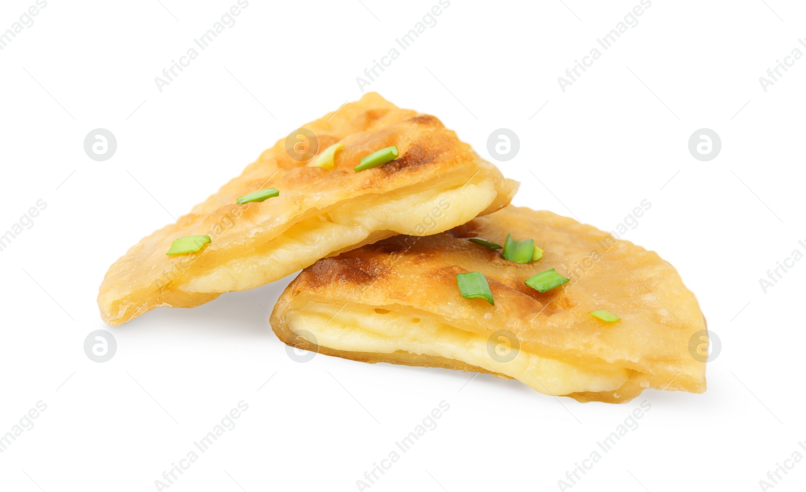 Photo of Cut delicious fried cheburek with cheese and green onion isolated on white