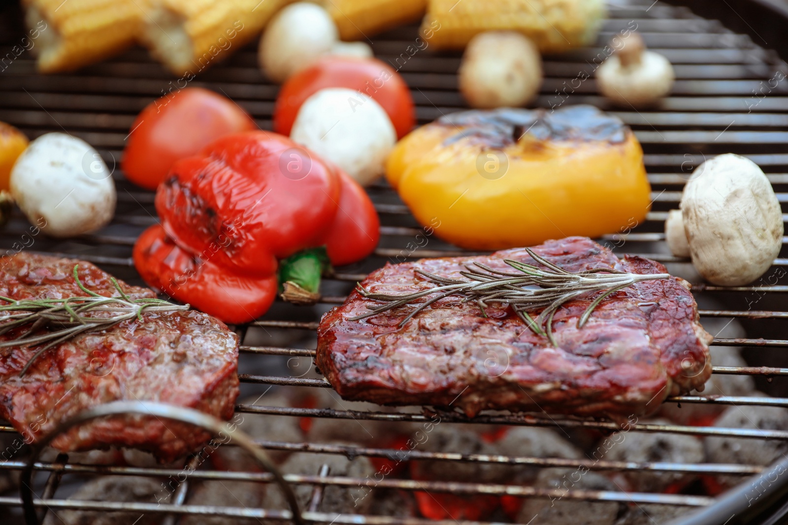 Photo of Barbecue grill with tasty fresh food, closeup