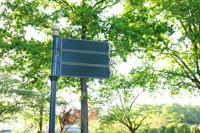 Photo of Park guide sign outdoors on sunny day