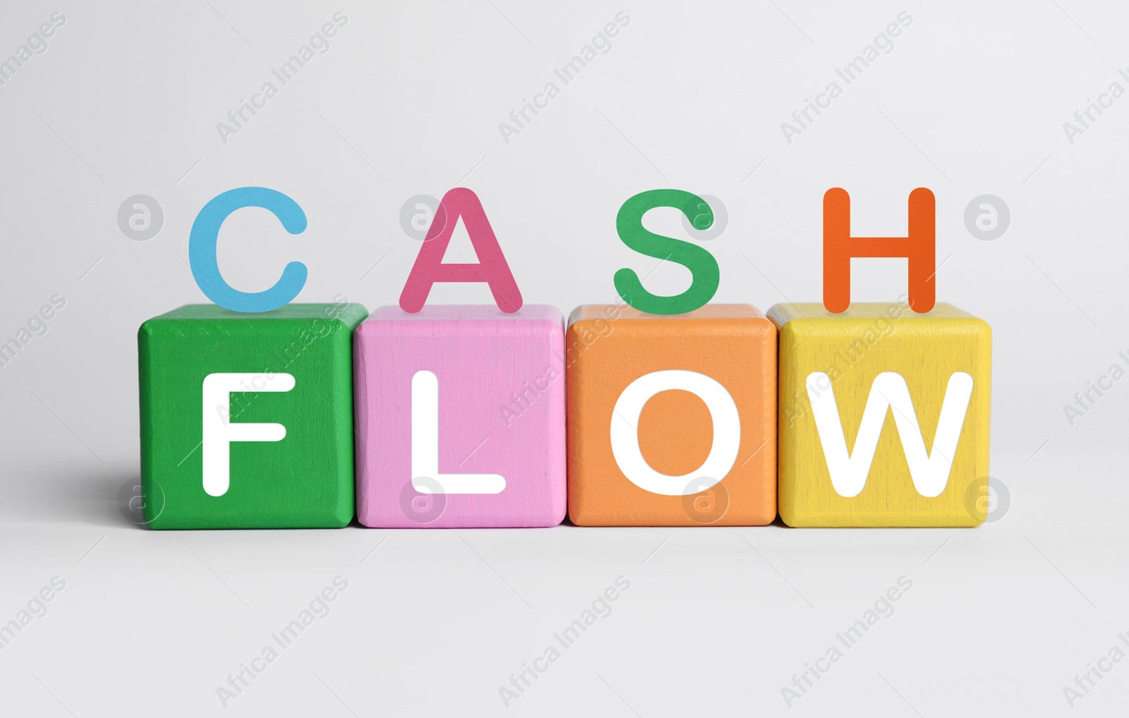 Image of Phrase Cash Flow made with letters and colorful cubes on white background