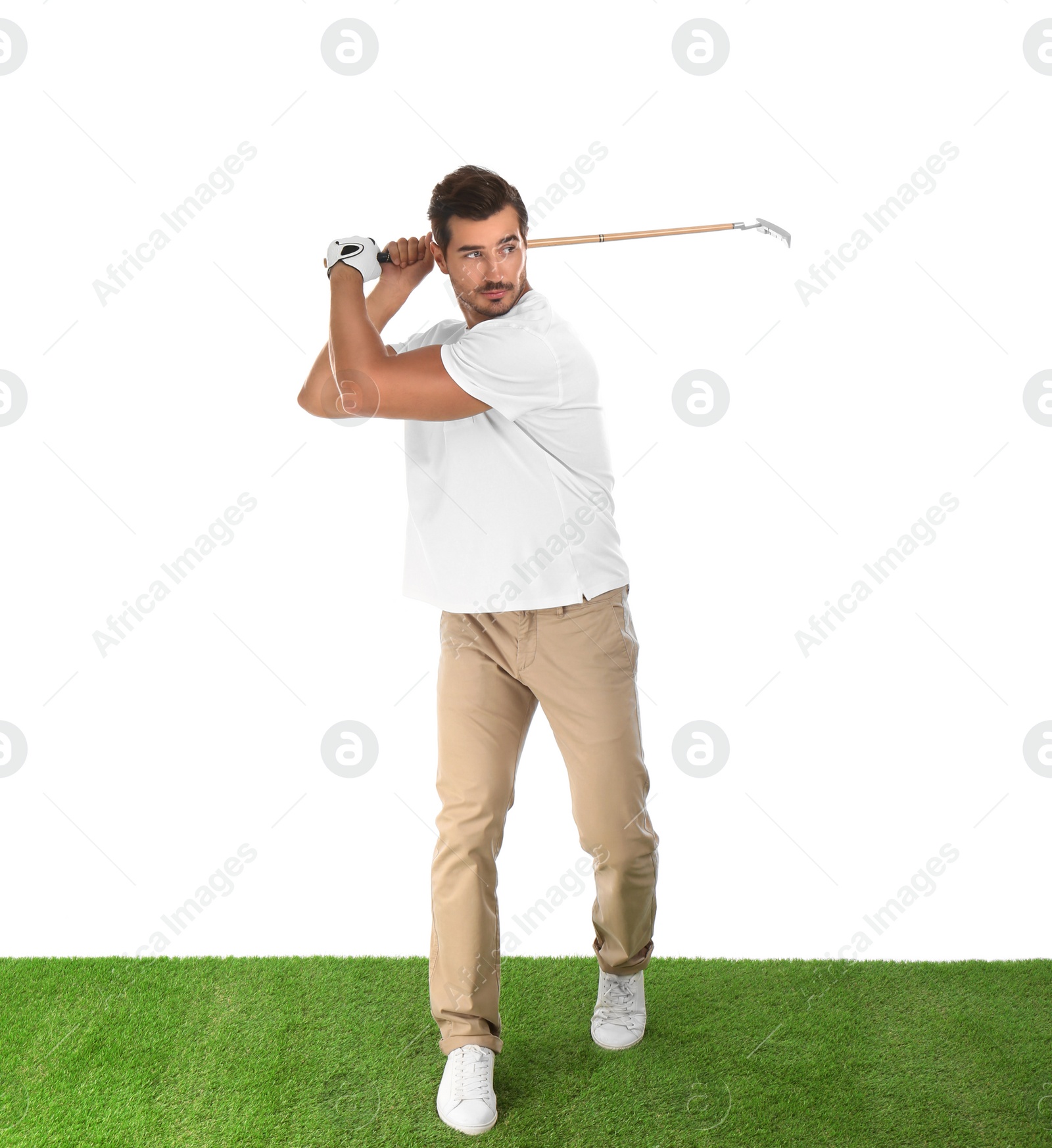 Photo of Young man playing golf on white background