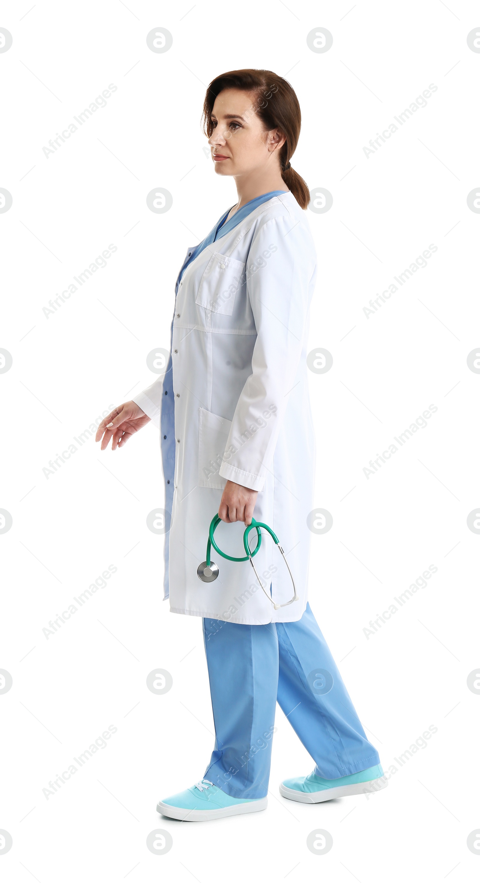 Photo of Full length portrait of experienced doctor in uniform on white background. Medical service