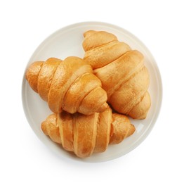 Photo of Plate with delicious fresh croissants isolated on white, top view