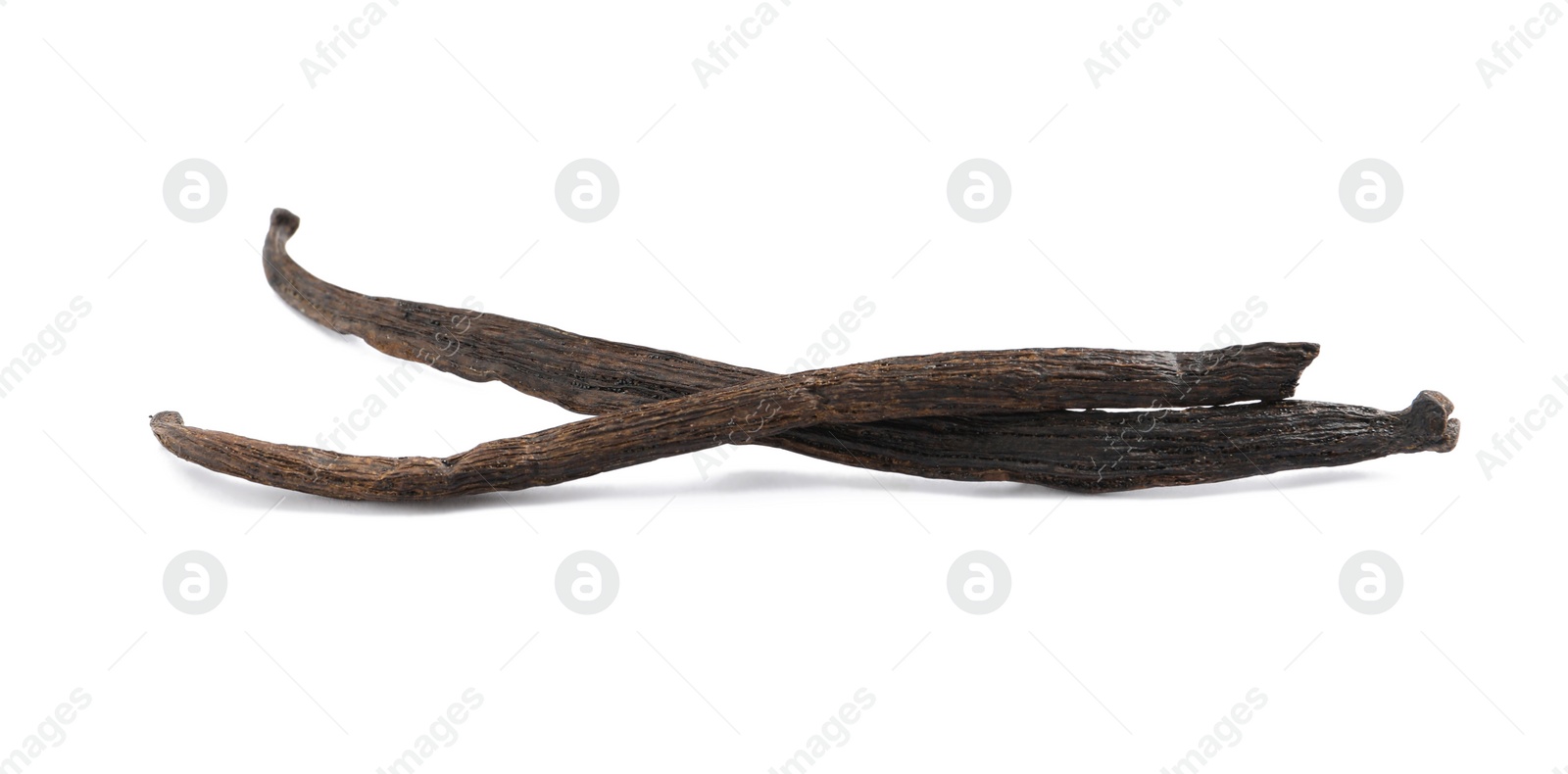 Photo of Dried aromatic vanilla sticks on white background