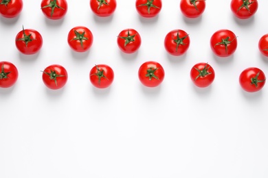 Composition with ripe cherry tomatoes on white background, top view