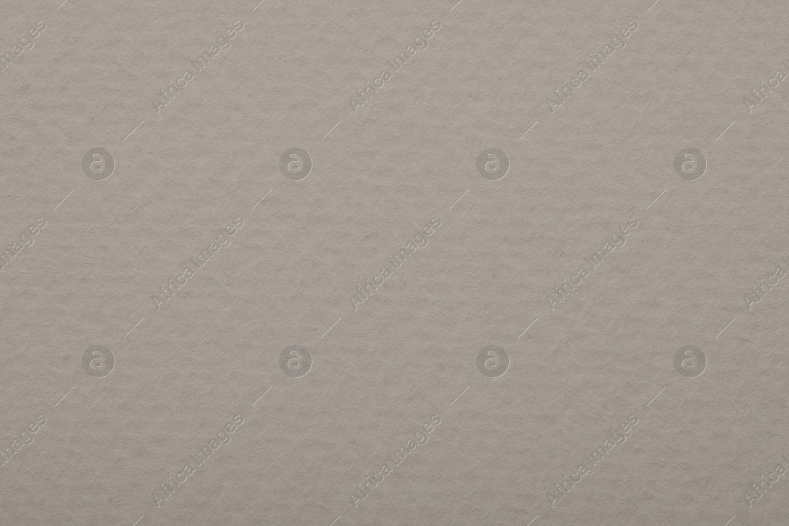 Photo of Texture of light grey paper sheet as background, top view