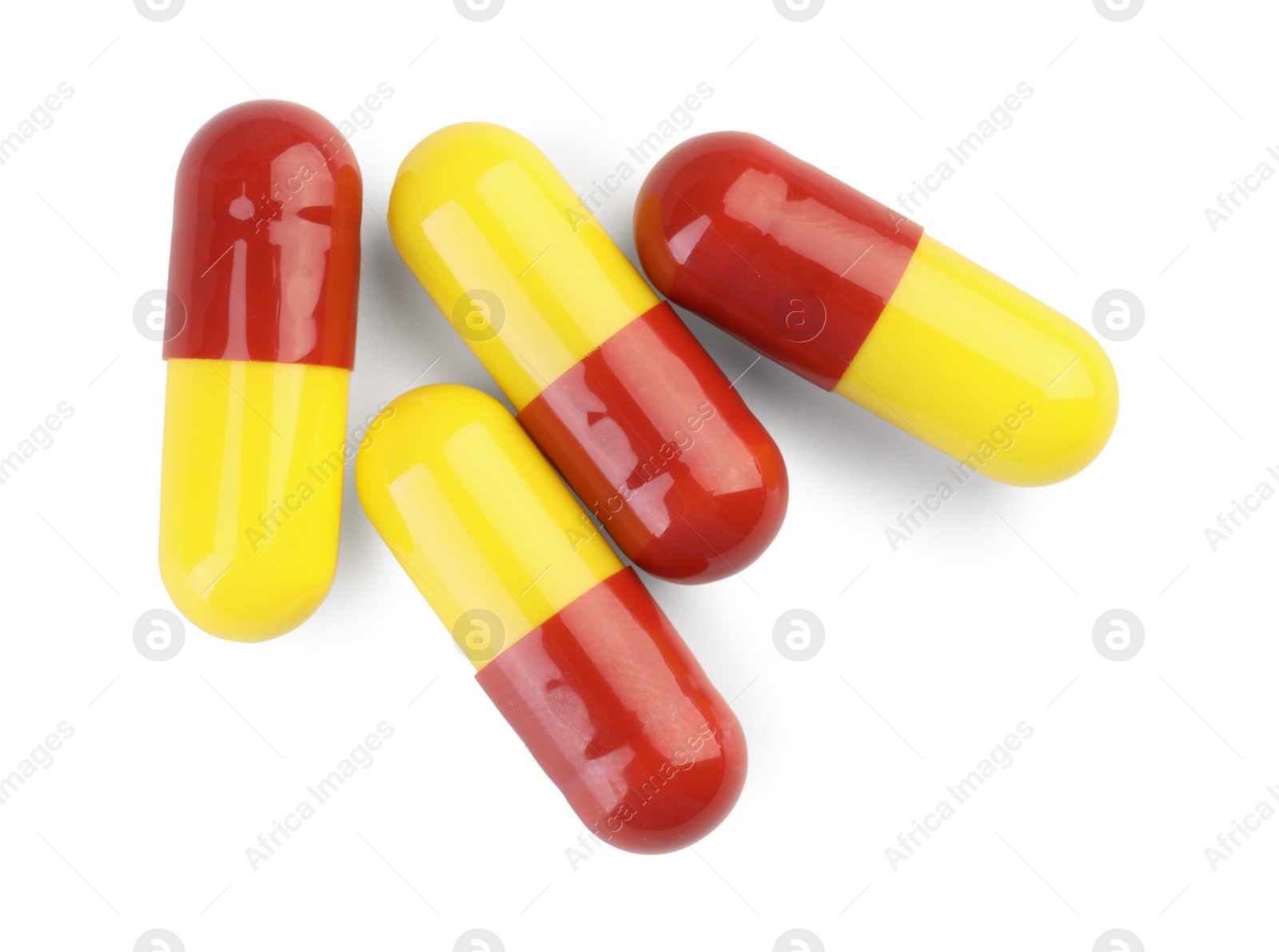 Photo of Many antibiotic pills isolated on white, top view