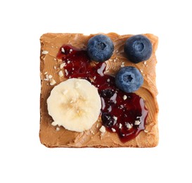 Photo of Toast with tasty nut butter, jam, blueberries, nuts and banana isolated on white, top view