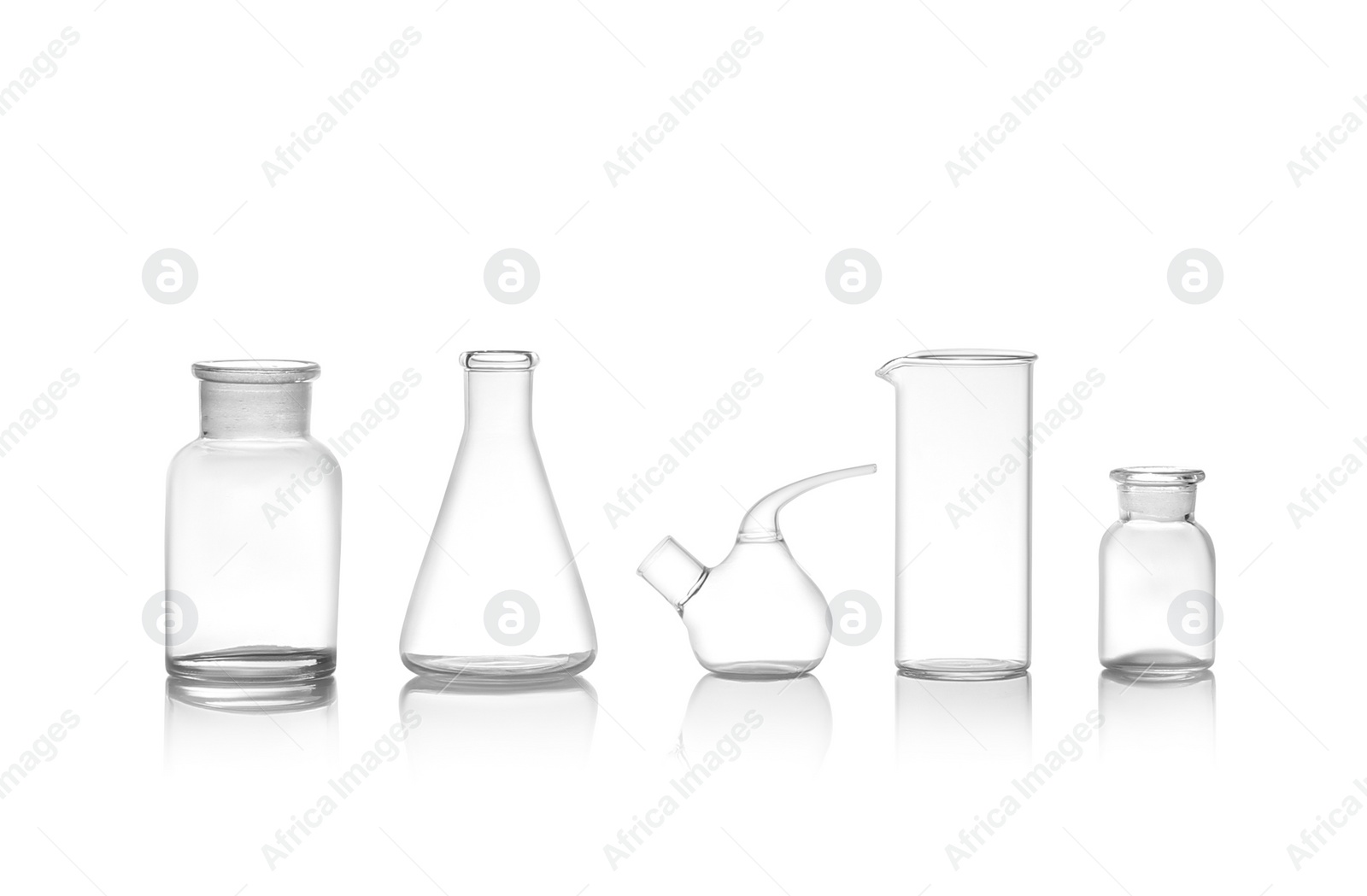 Photo of Clean empty laboratory glassware isolated on white