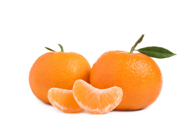 Photo of Fresh ripe tangerines with leaf isolated on white. Citrus fruit