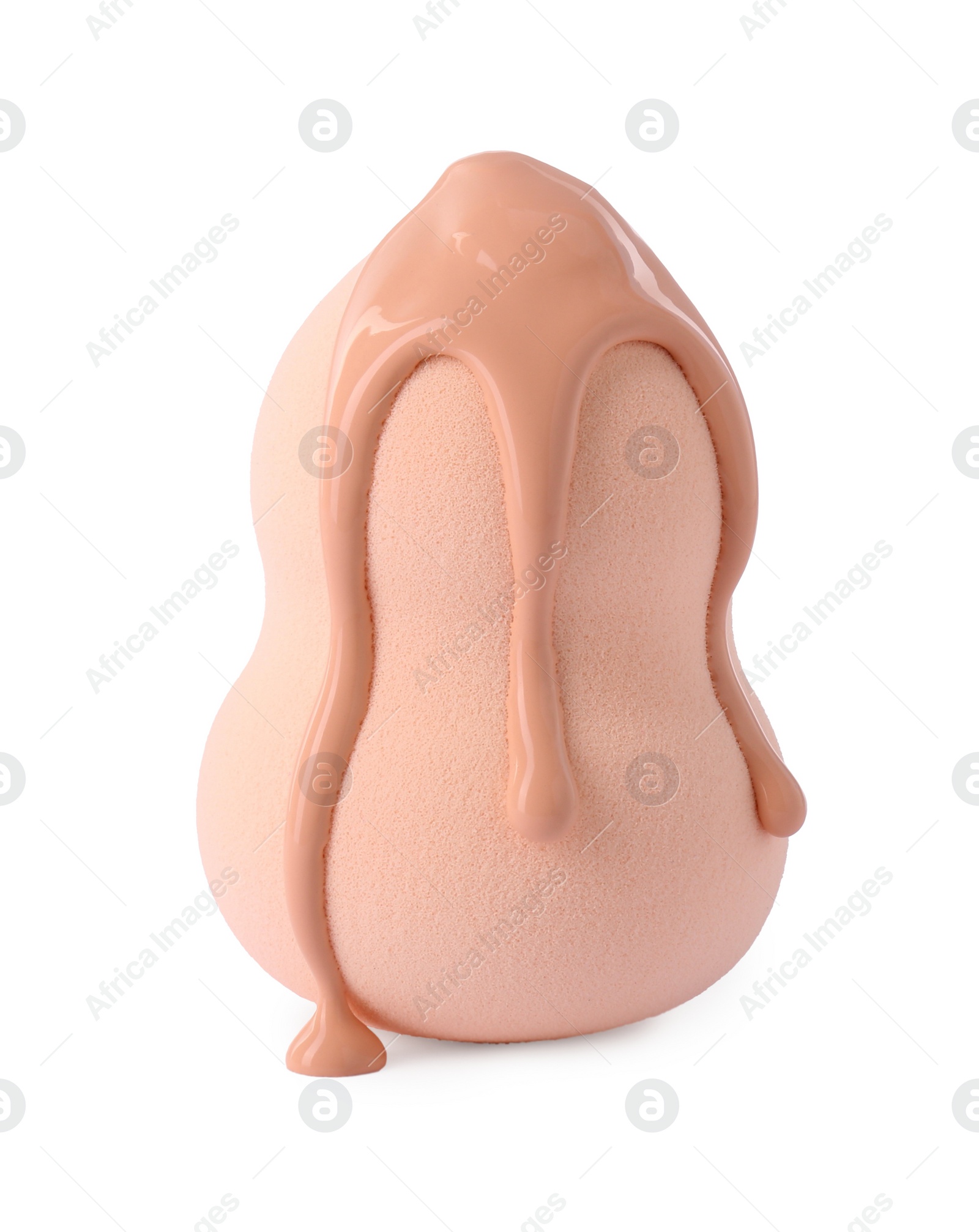 Photo of Beige makeup sponge with skin foundation isolated on white