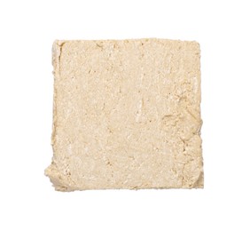 One piece of tasty halva isolated on white, top view