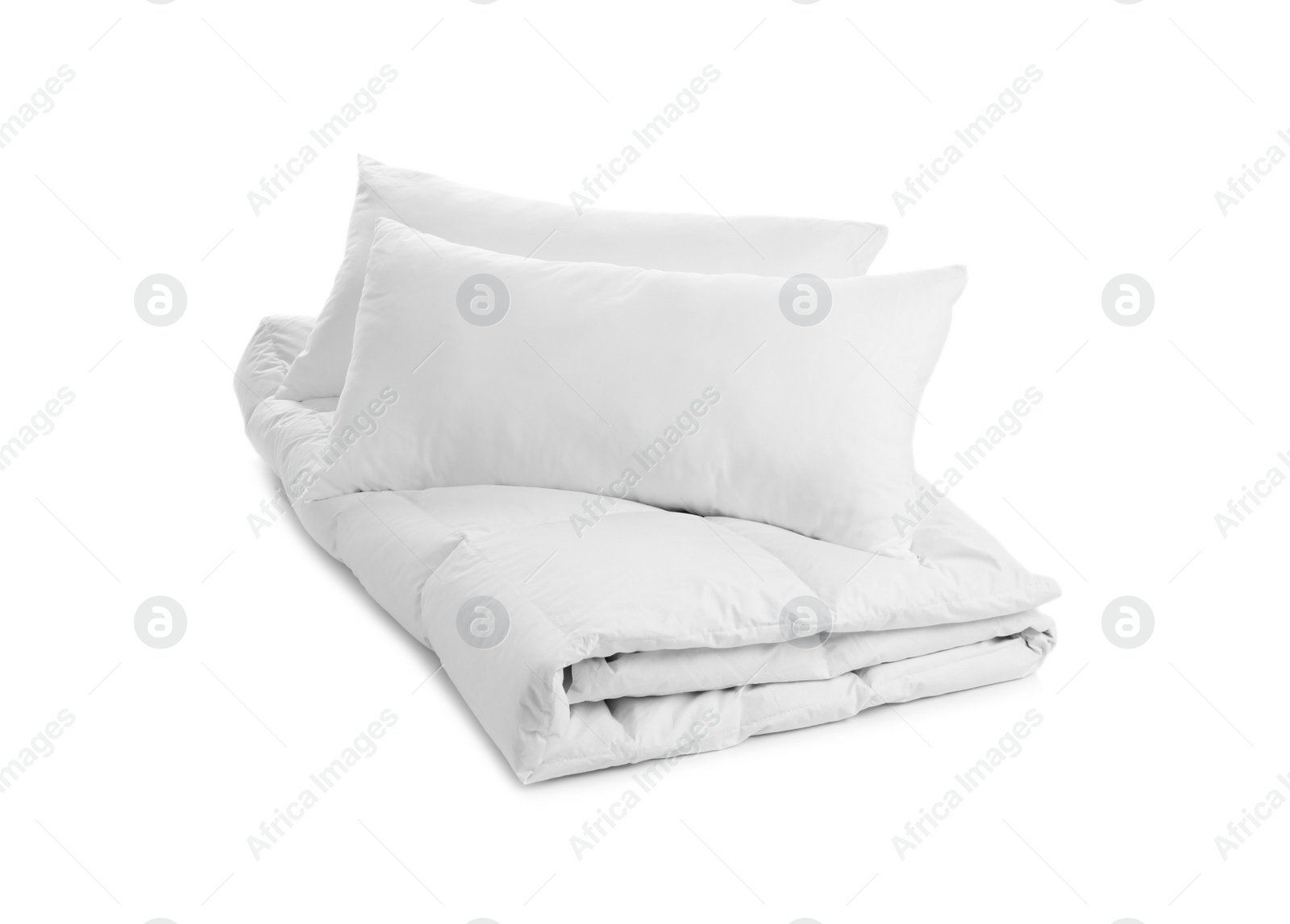 Photo of Soft blanket and pillows on white background