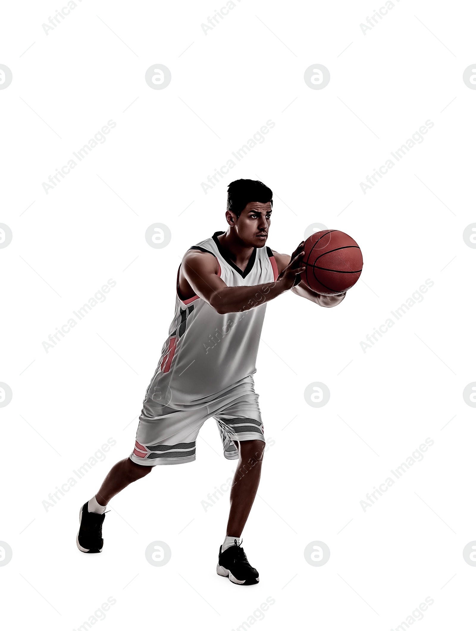 Image of Silhouette of professional sportsman playing basketball on white background