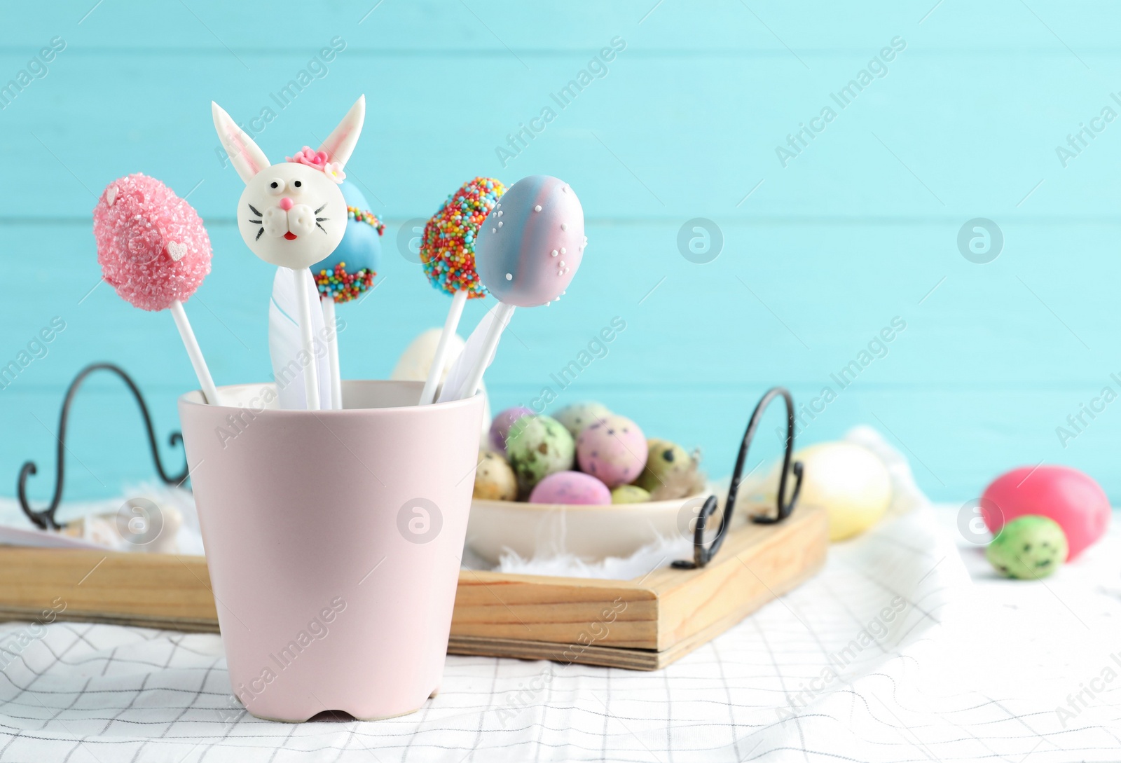 Photo of Different cake pops on table, space for text. Easter holiday