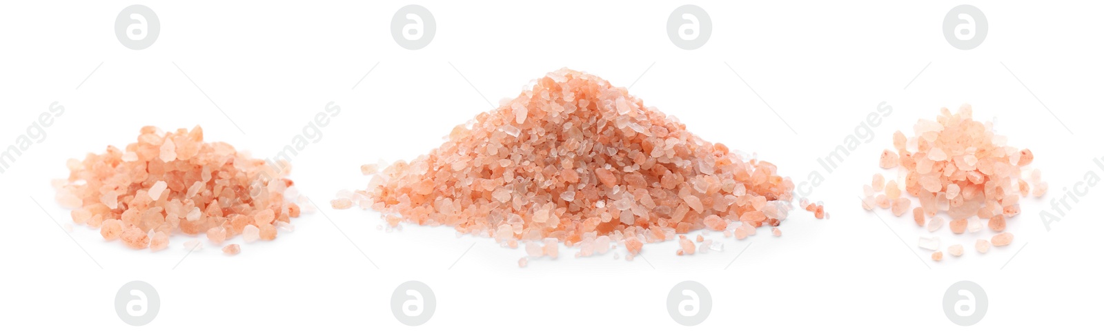 Image of Piles of pink himalayan salt on white background. Banner design 