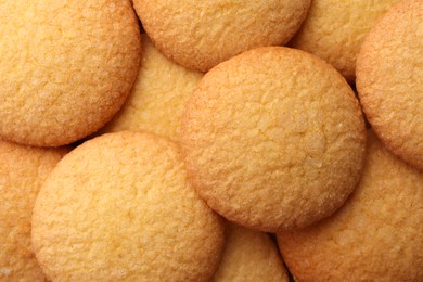 Delicious butter cookies as background, top view