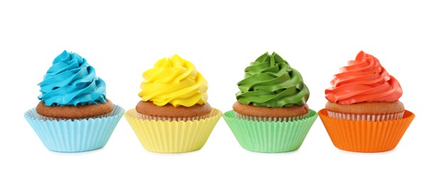 Different delicious colorful cupcakes on white background