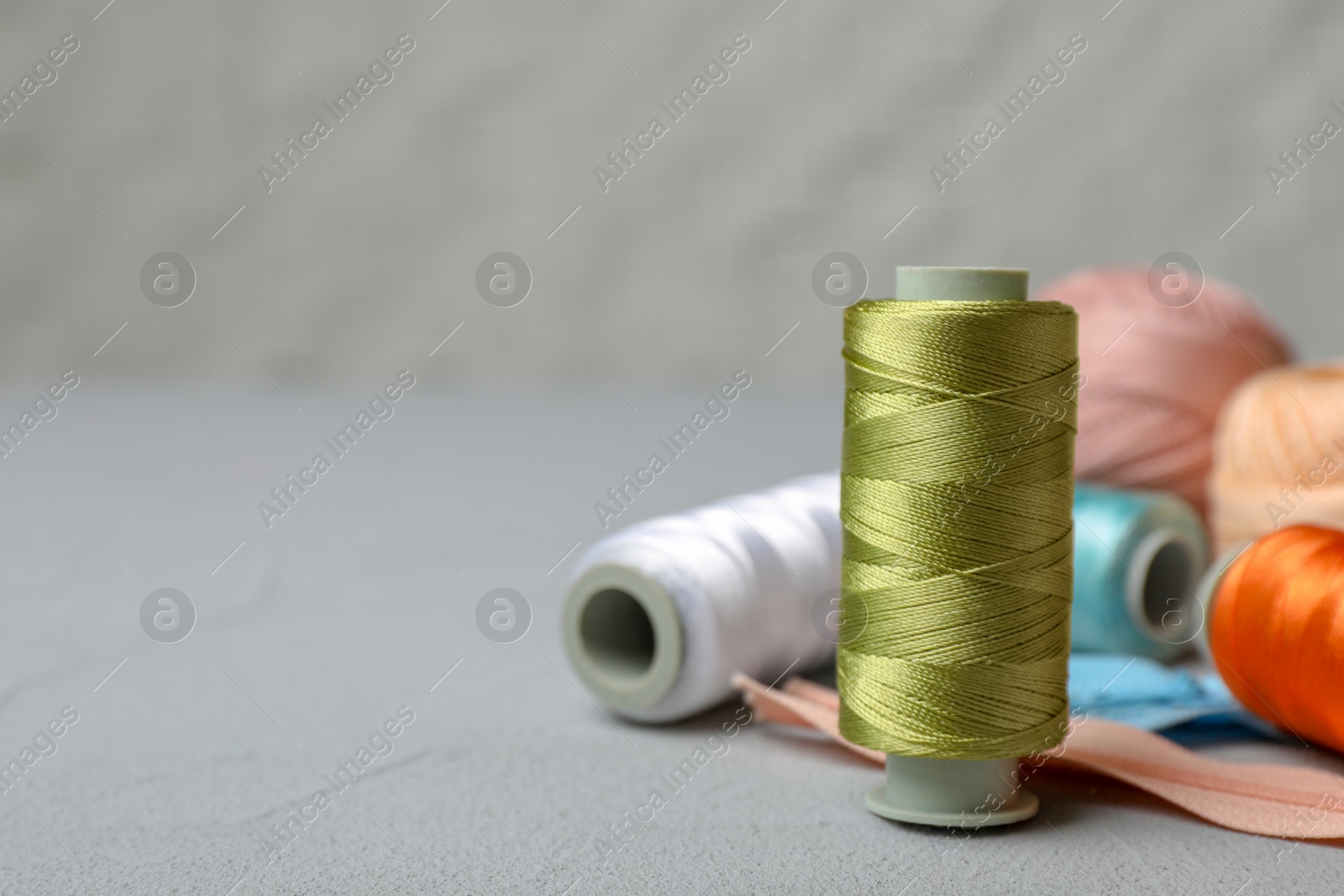 Photo of Color sewing threads on table