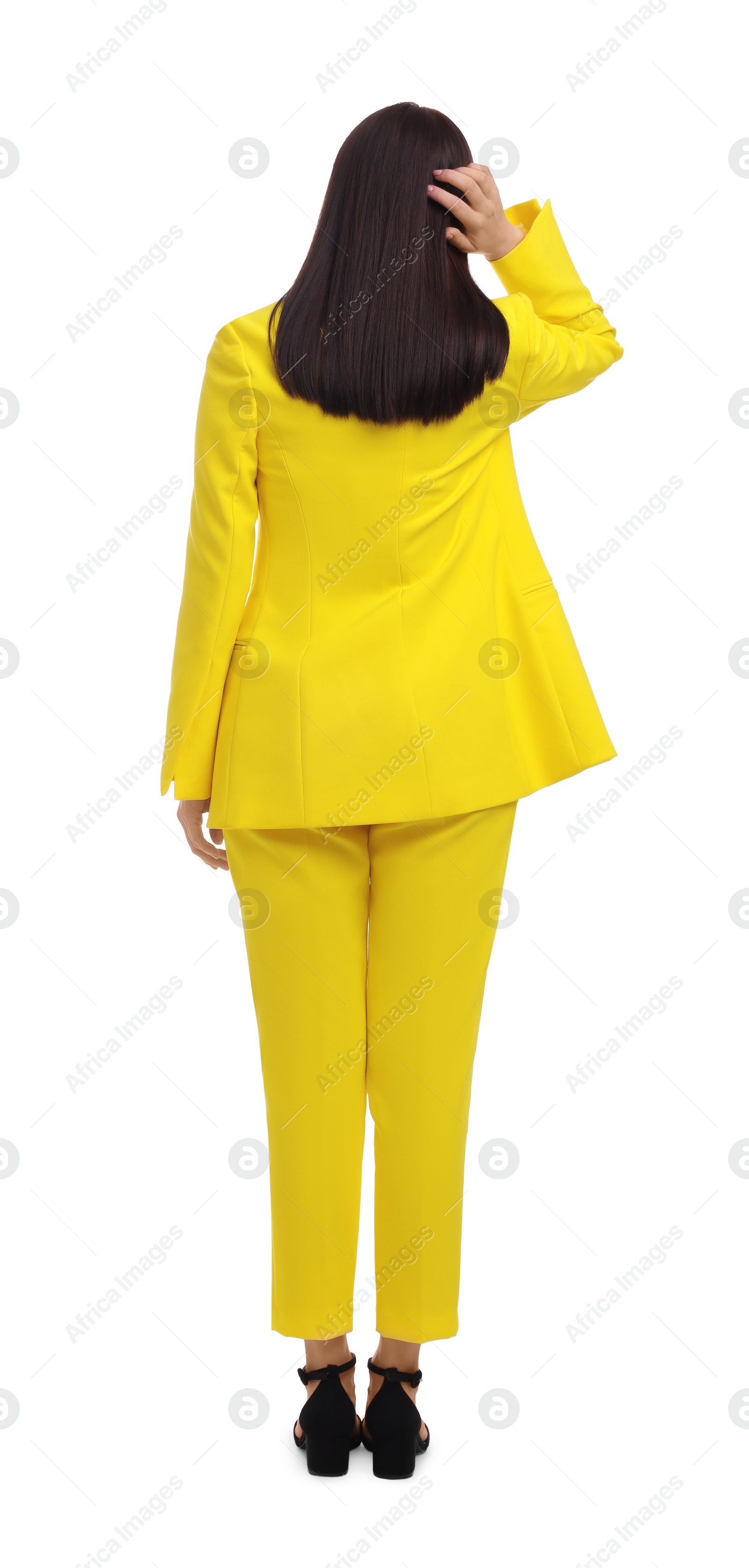 Photo of Businesswoman in yellow suit on white background, back view