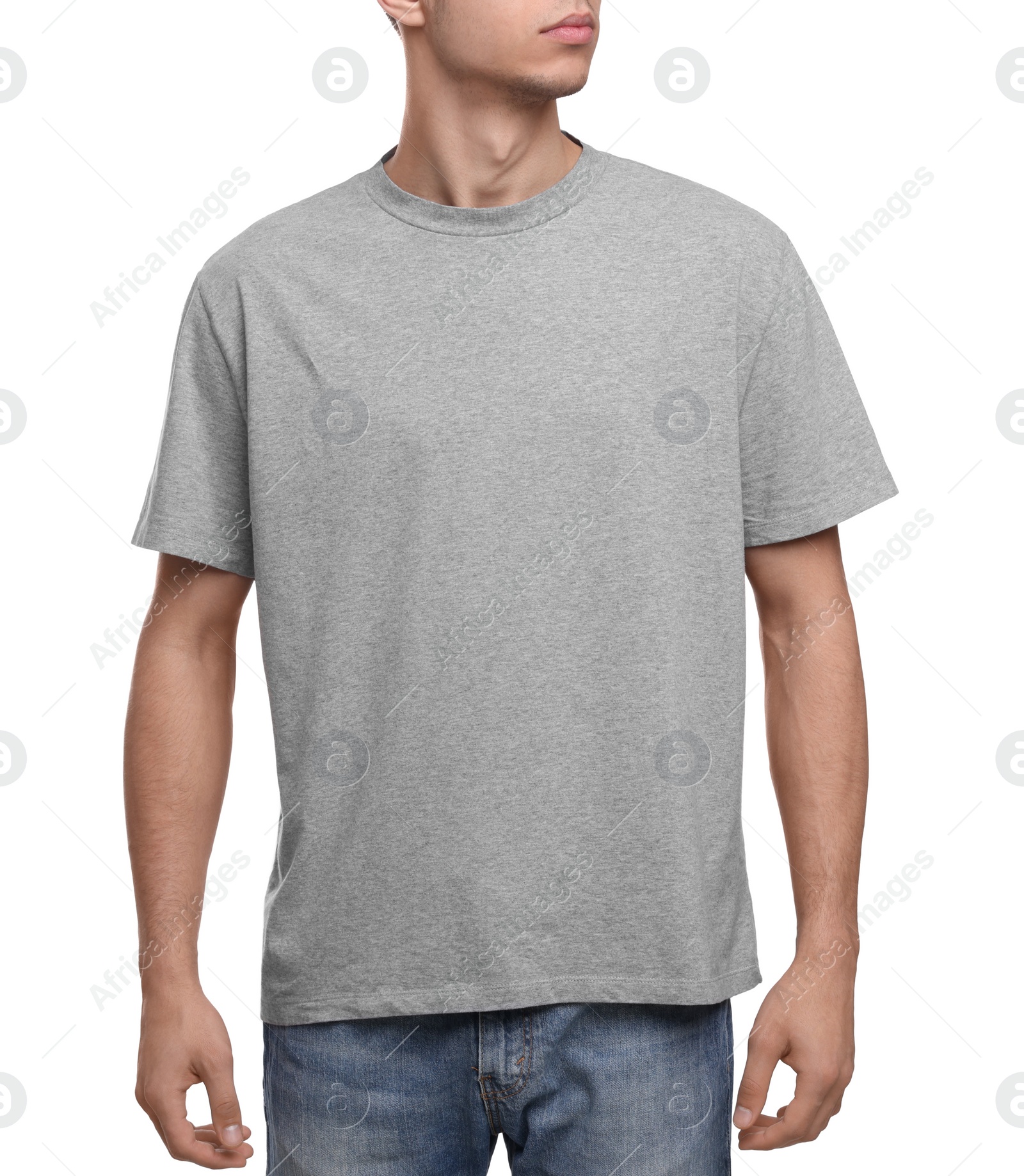 Photo of Young man wearing grey t-shirt on white background, closeup