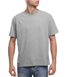 Photo of Young man wearing grey t-shirt on white background, closeup