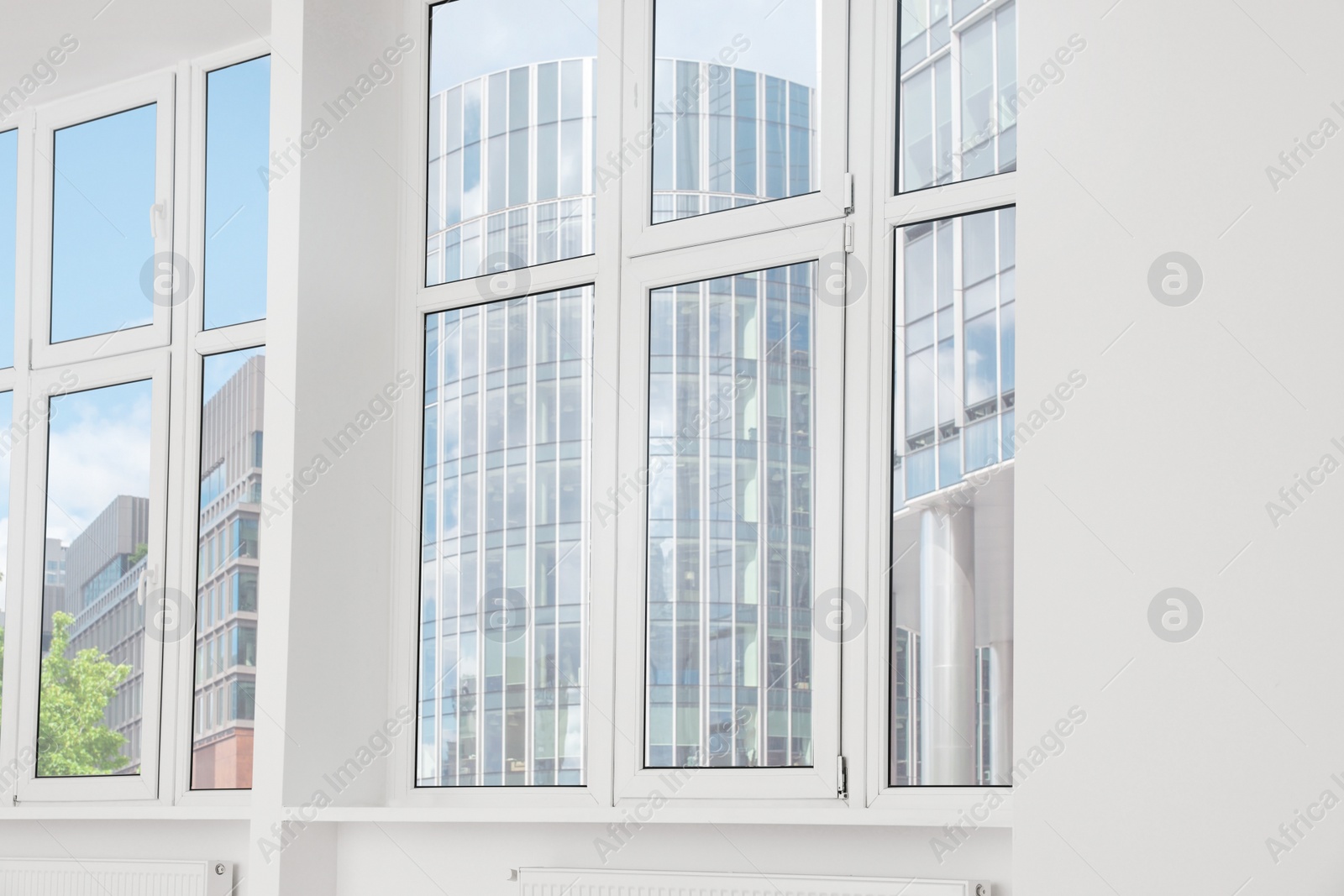 Photo of Empty office room with clean windows. Interior design