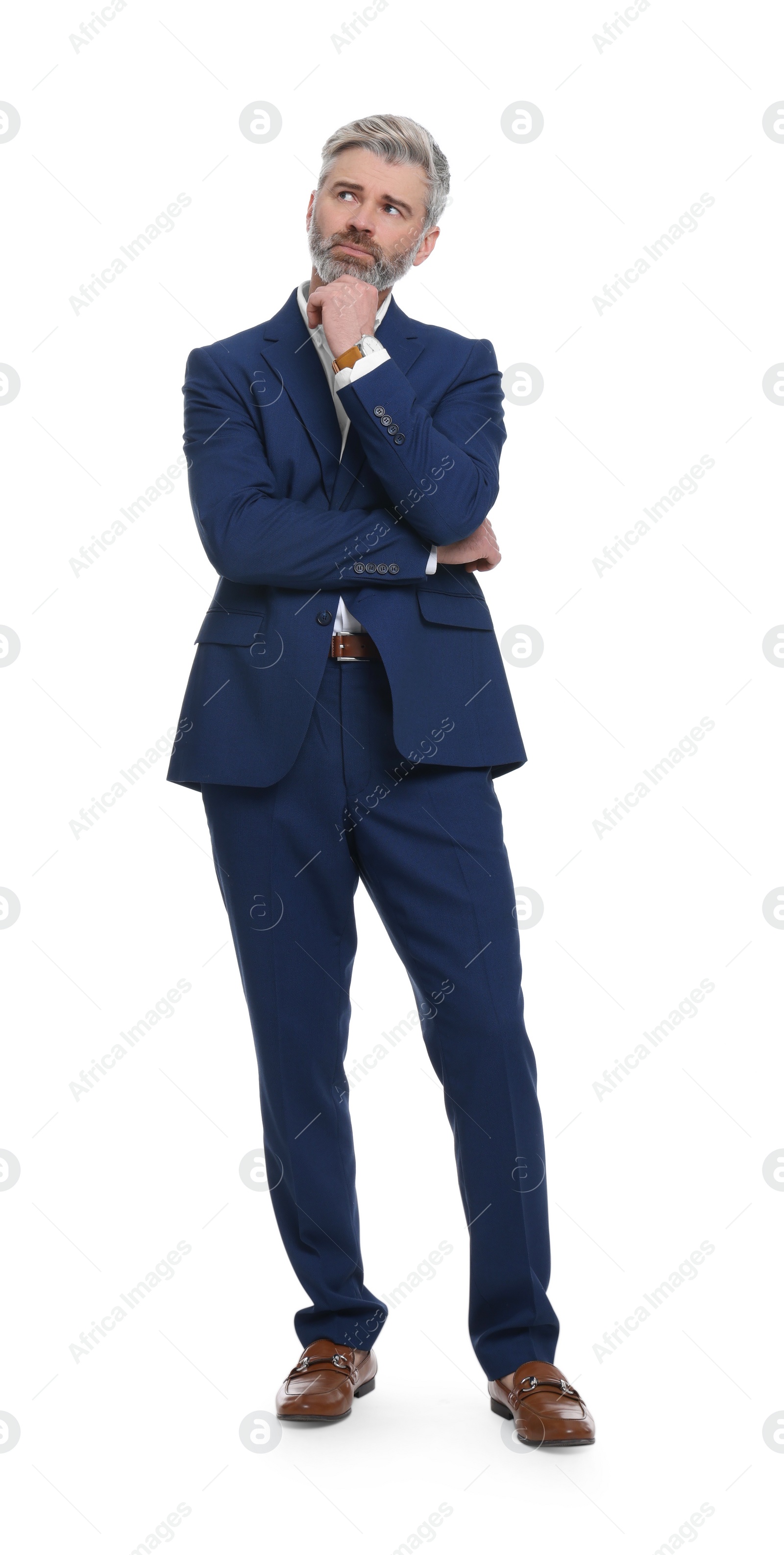 Photo of Mature businessman in stylish clothes posing on white background