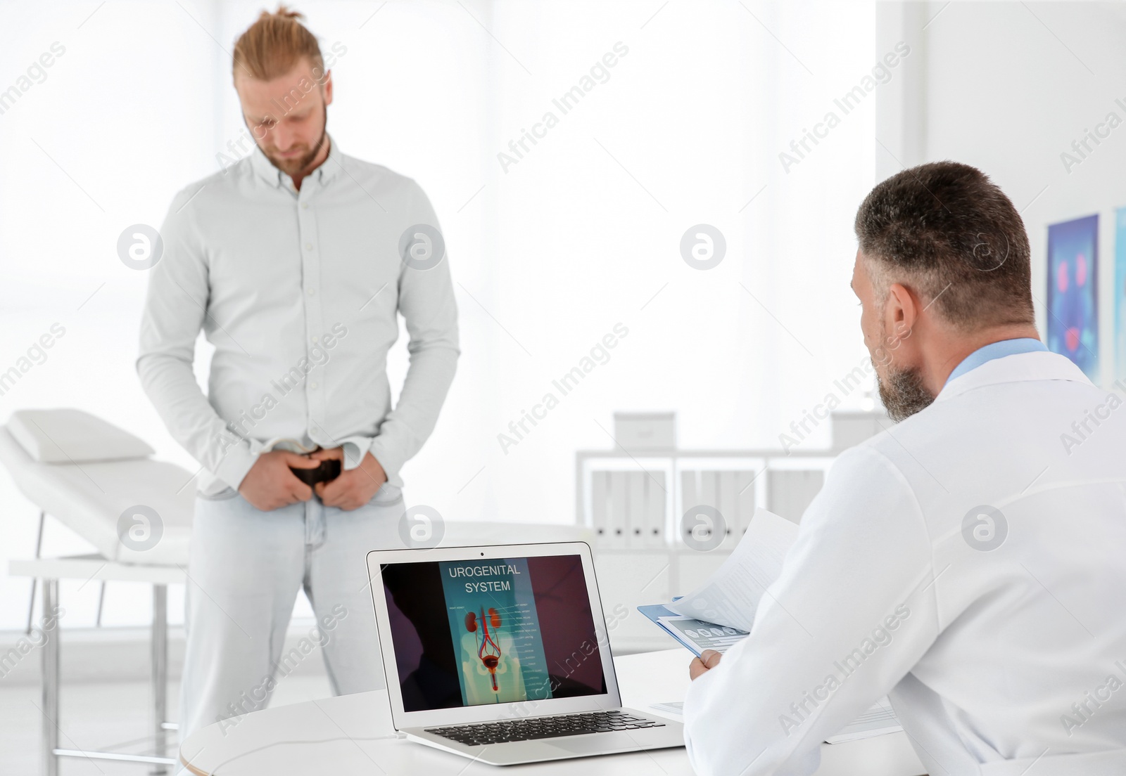 Photo of Man with health problems visiting urologist at hospital