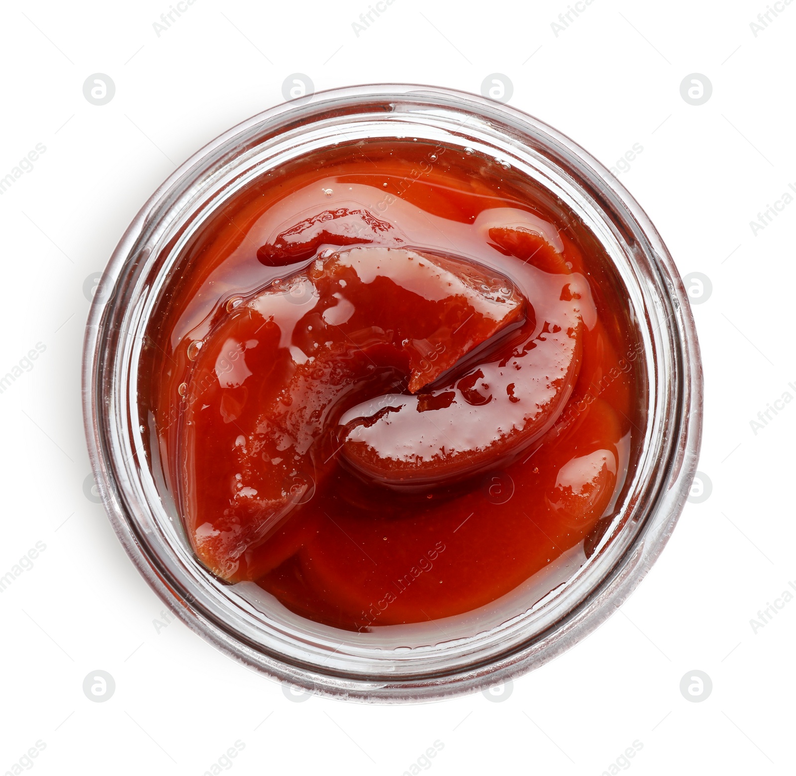 Photo of Tasty homemade quince jam in jar isolated on white, top view