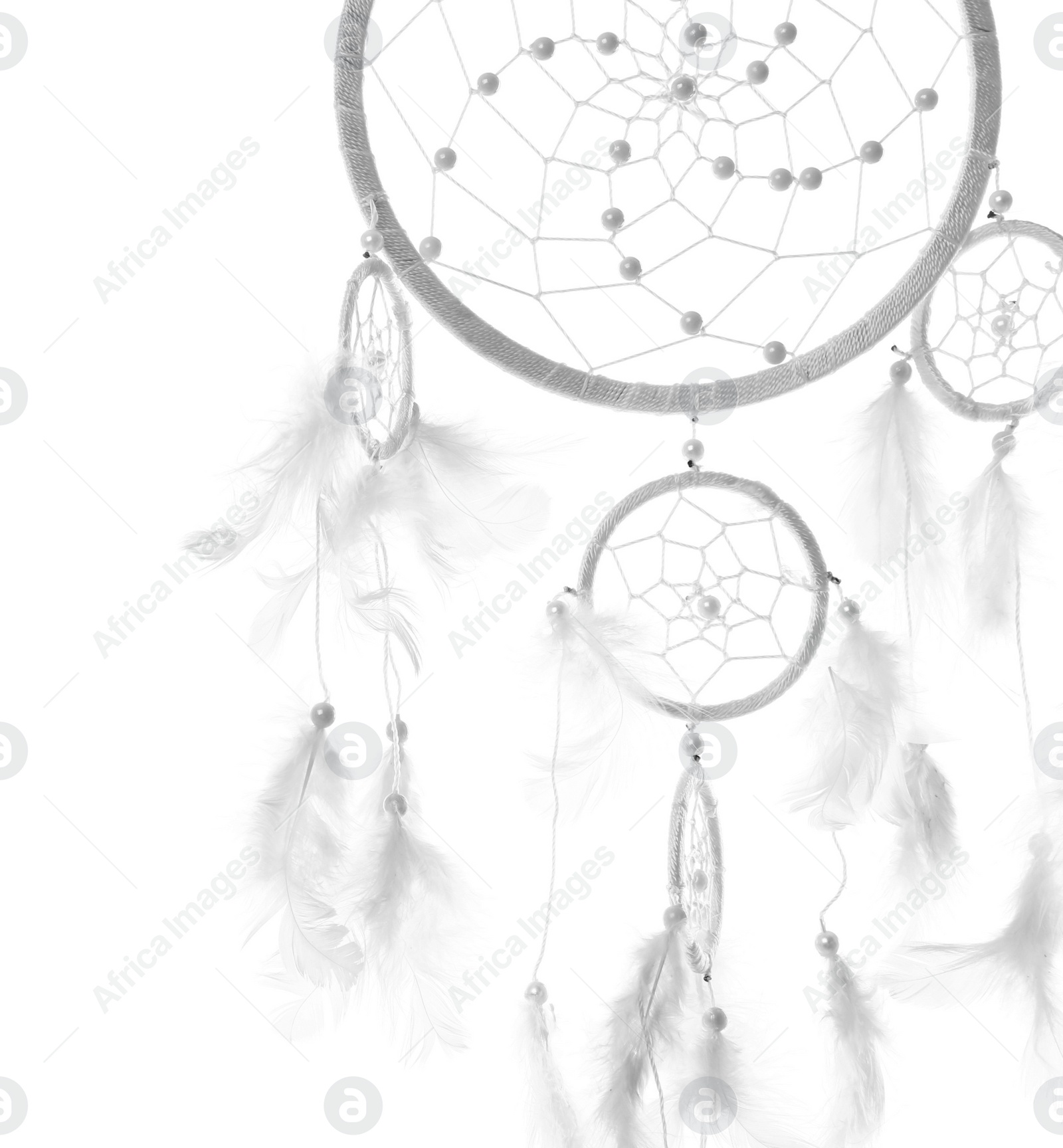 Photo of Beautiful handmade dream catcher on white background, closeup