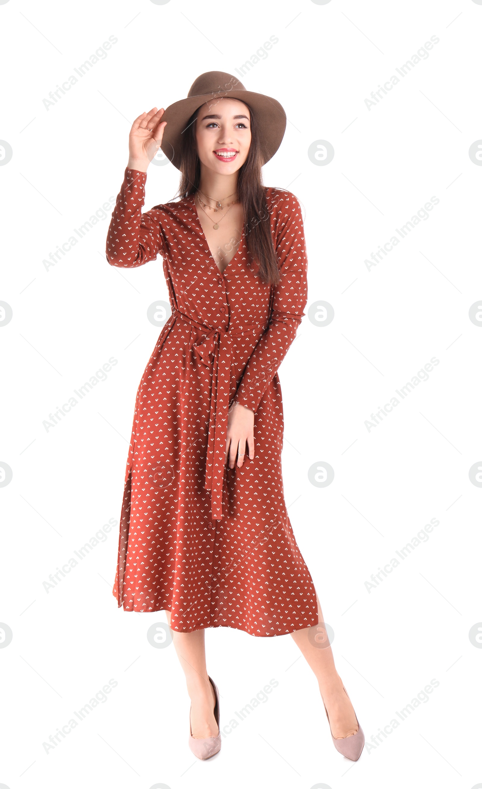 Photo of Portrait of beautiful young woman in stylish dress on white background