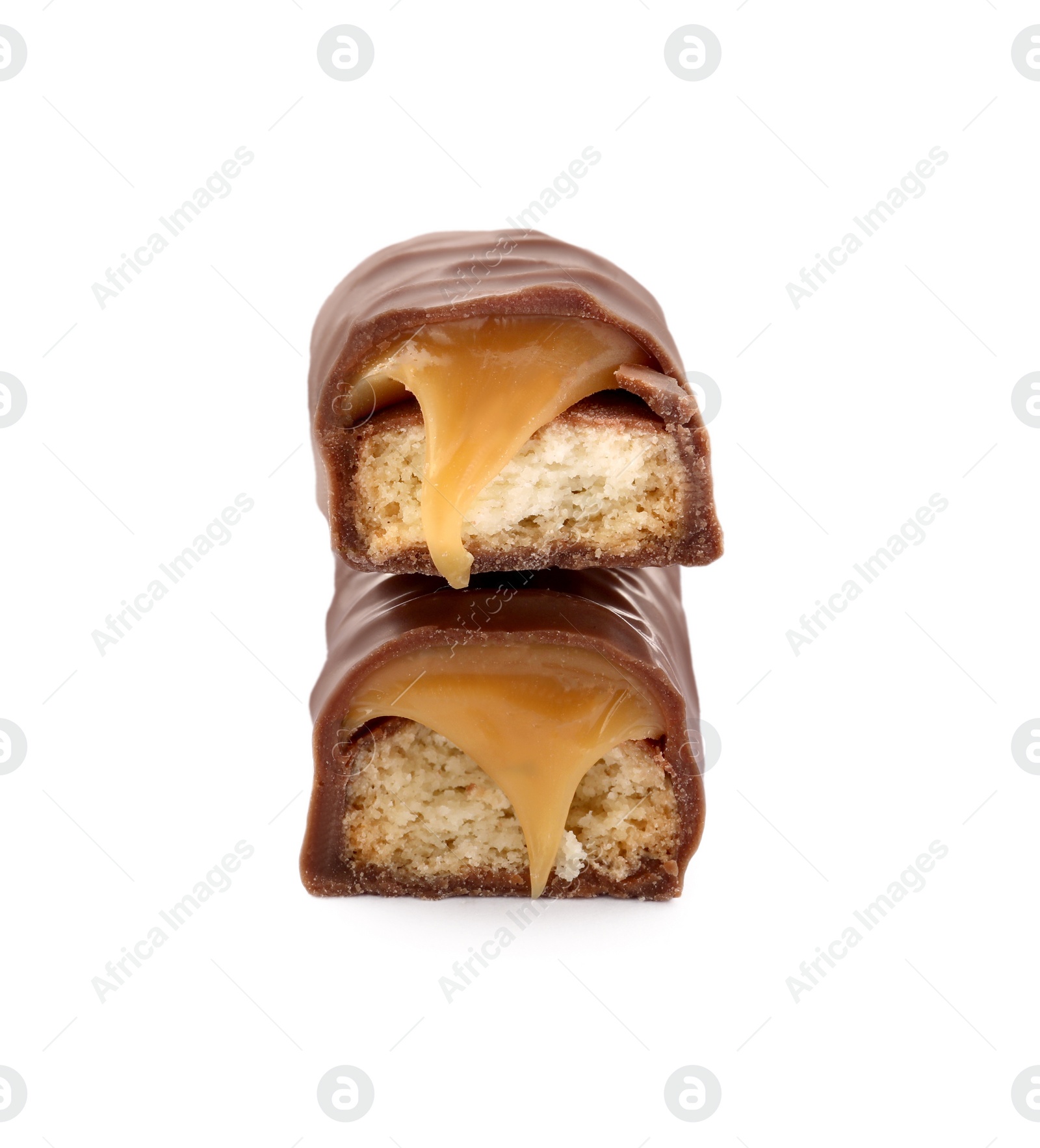 Photo of Pieces of chocolate bar with caramel on white background, closeup