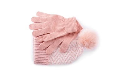 Photo of Pink woolen gloves and hat on white background, top view. Winter clothes