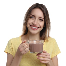 Young woman with glass cup of chocolate milk on white background