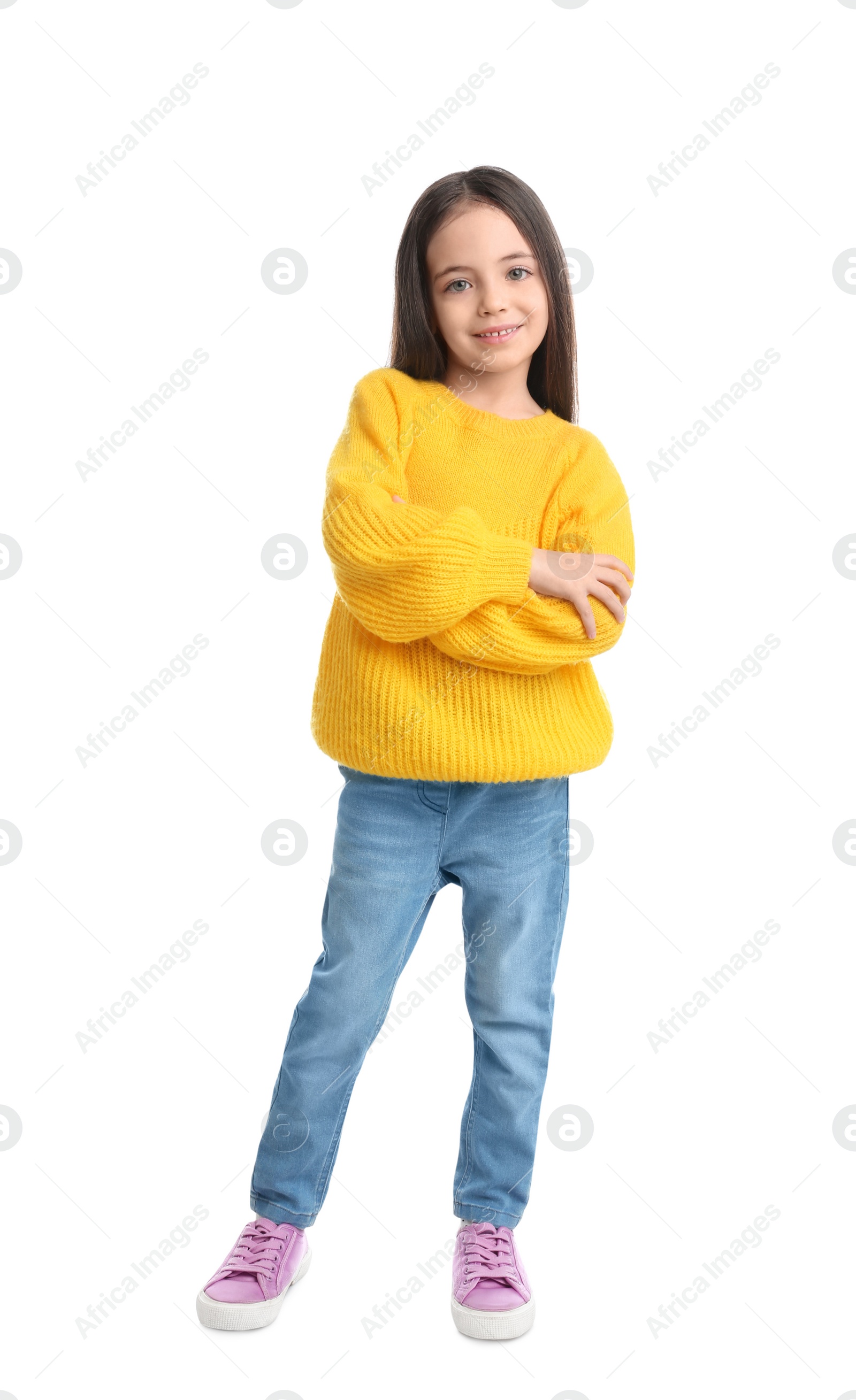 Photo of Cute little girl posing on white background