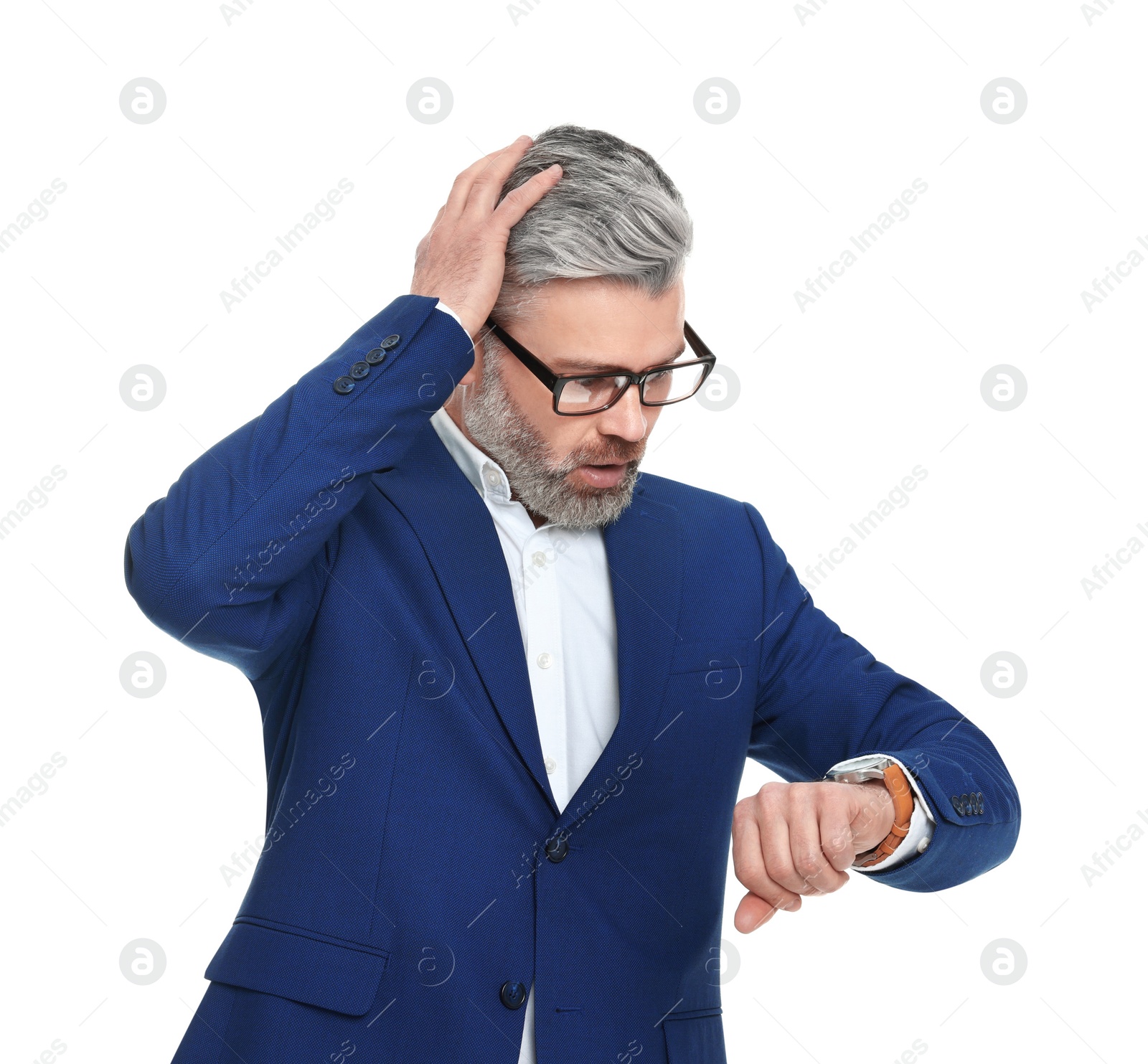 Photo of Mature businessman in stylish clothes checking time on white background