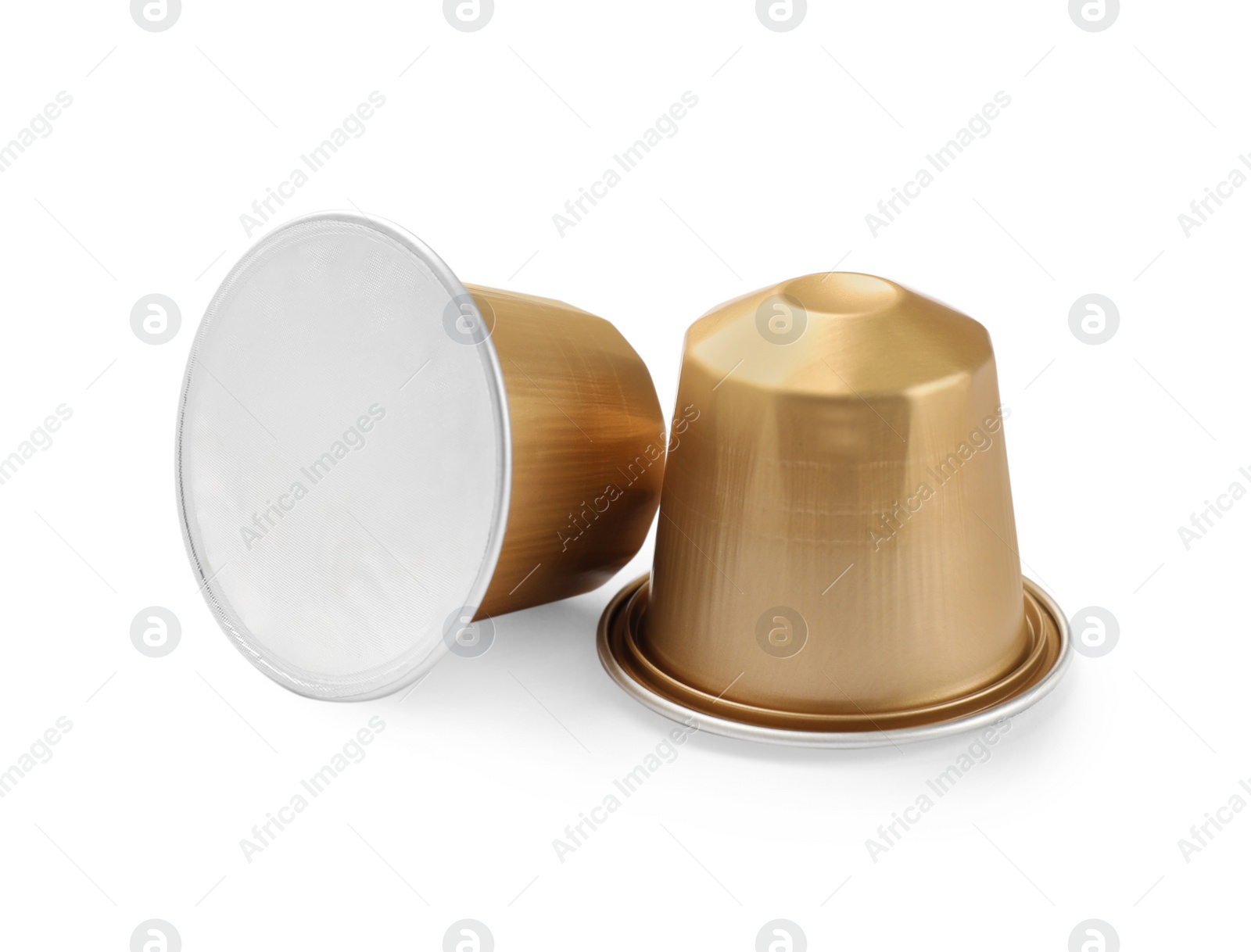 Photo of Two plastic coffee capsules isolated on white