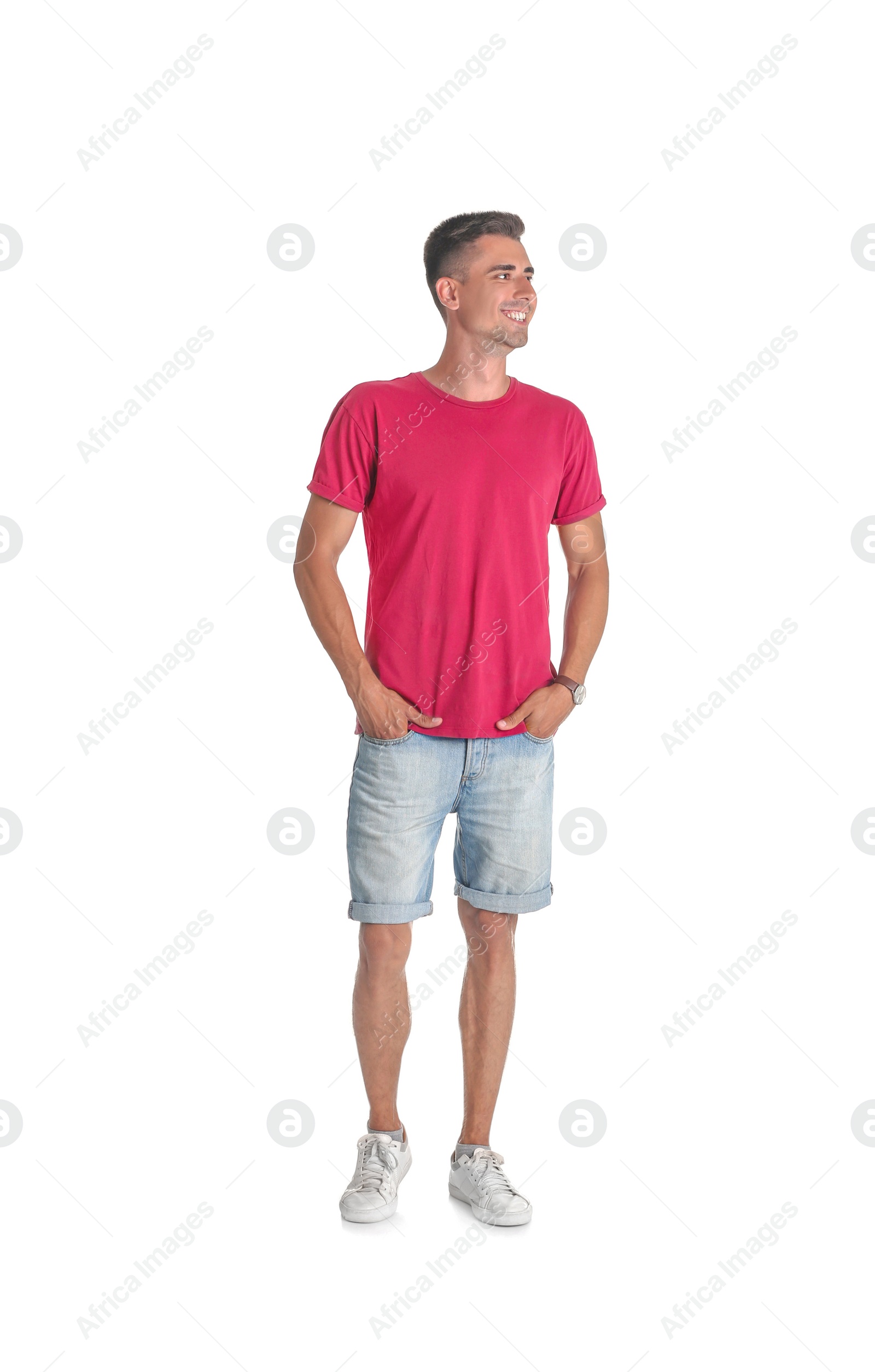 Photo of Handsome young man smiling on white background