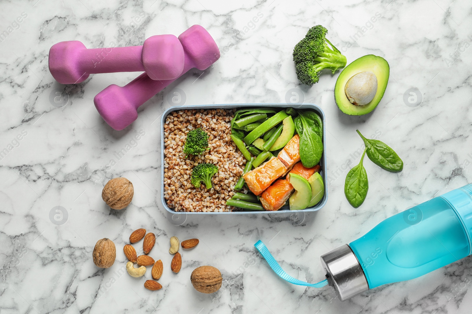 Photo of Flat lay composition with container of natural protein food on marble background