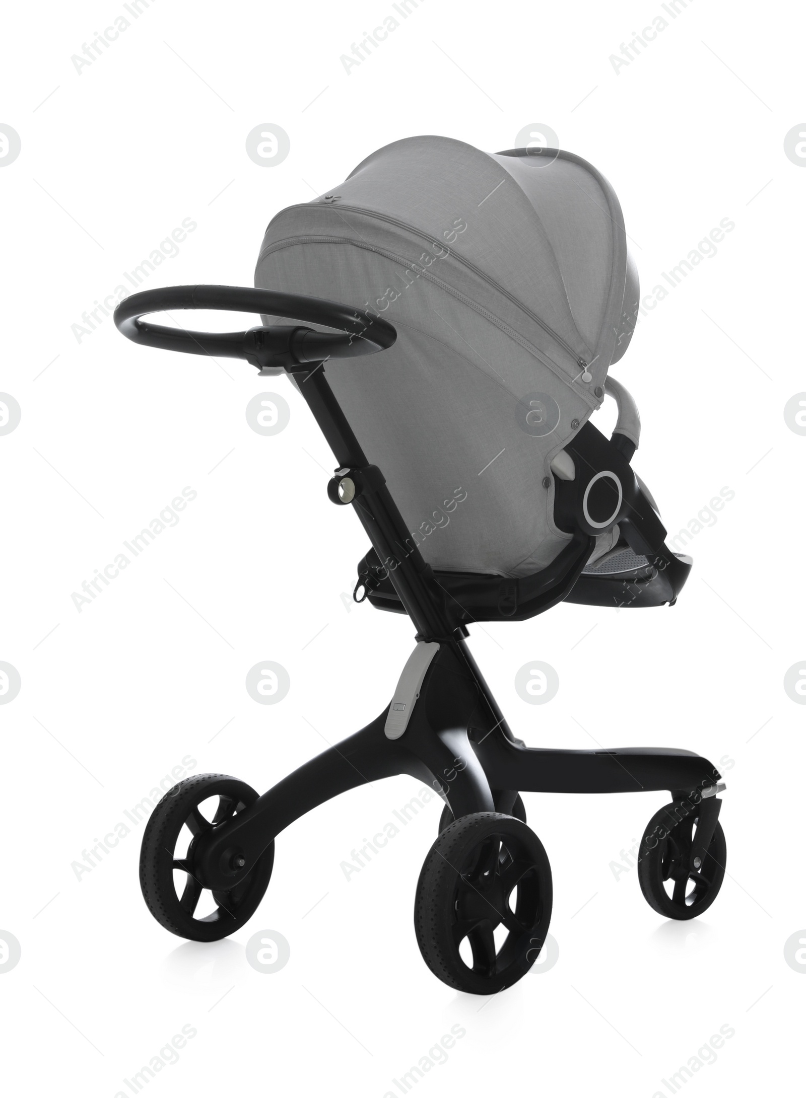 Photo of Baby carriage. Modern pram isolated on white