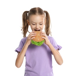 Photo of Happy girl eating sandwich on white background. Healthy food for school lunch