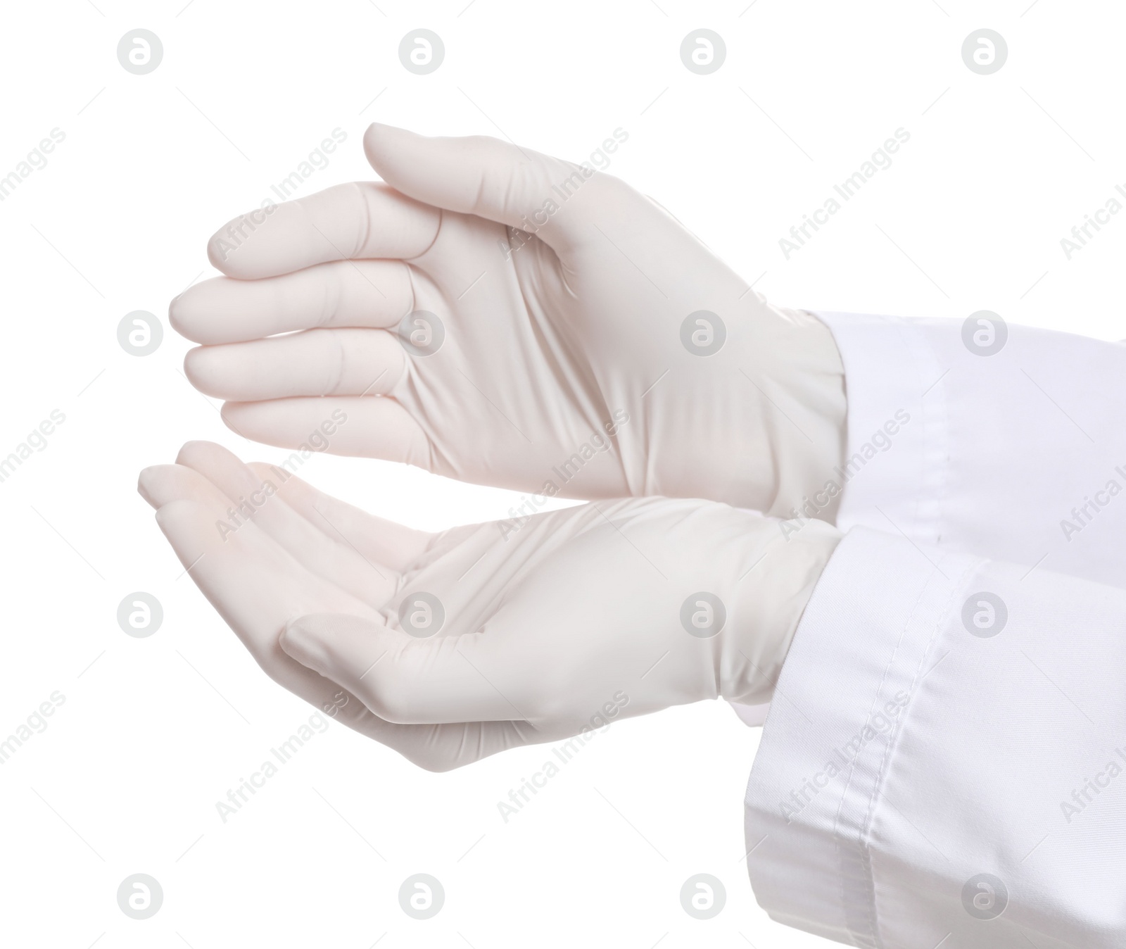 Photo of Doctor wearing medical gloves on white background, closeup