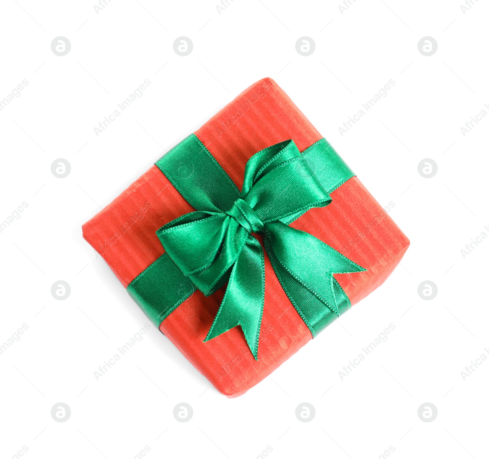 Photo of Beautifully wrapped gift box on white background, top view